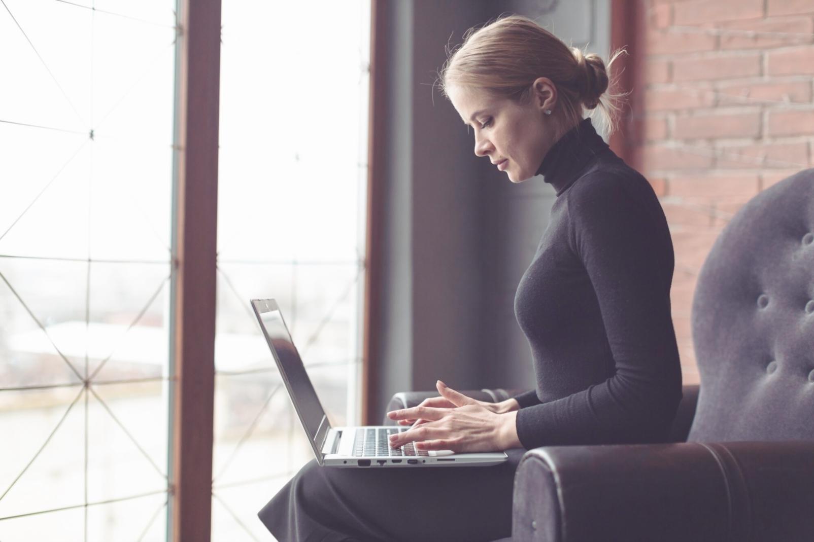 OnLogicFlux office workspace with financial analysis tools displayed on screens